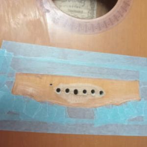 acoustic guitar brideg repair