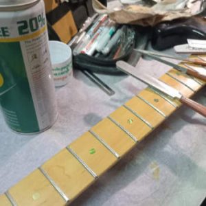 refretting electric guitar